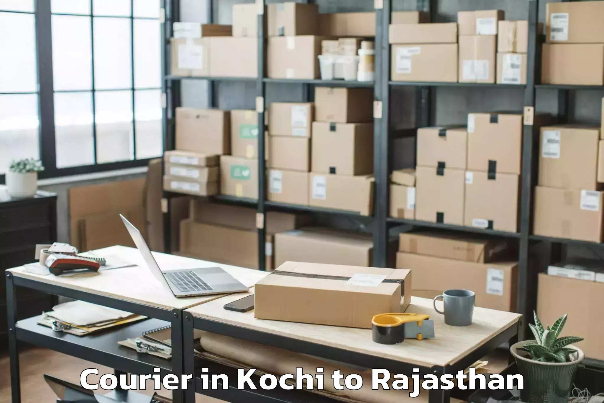 Book Kochi to Ladnu Courier